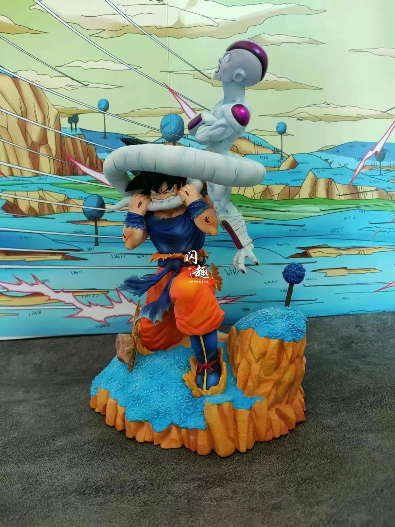 Dragon Ball Z Inspired Goku Biting Frieza's Tail Action Statue